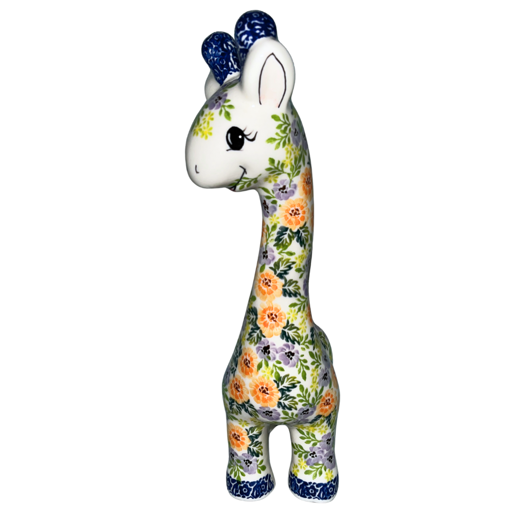 11" ceramic giraffe figurine with orange and lavender floral pattern and blue accents. Glossy finish decorative piece for home décor, nursery styling, or collectible display.