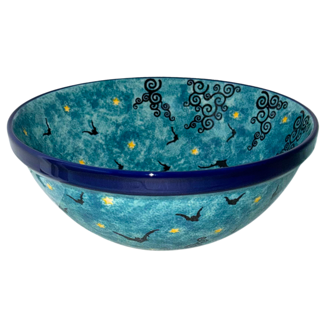 Ceramika Artystyczna U5264 Polish Pottery bowl with flying bats, golden moon and stars on a turquoise blue night sky, handcrafted in Bolesławiec, Poland.