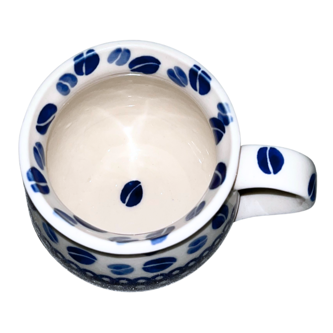 Handmade Kaola Polish Pottery in the Blue Coffee Beans pattern. Authentic Bolesławiec stoneware featuring hand-painted cobalt blue coffee bean motifs.
