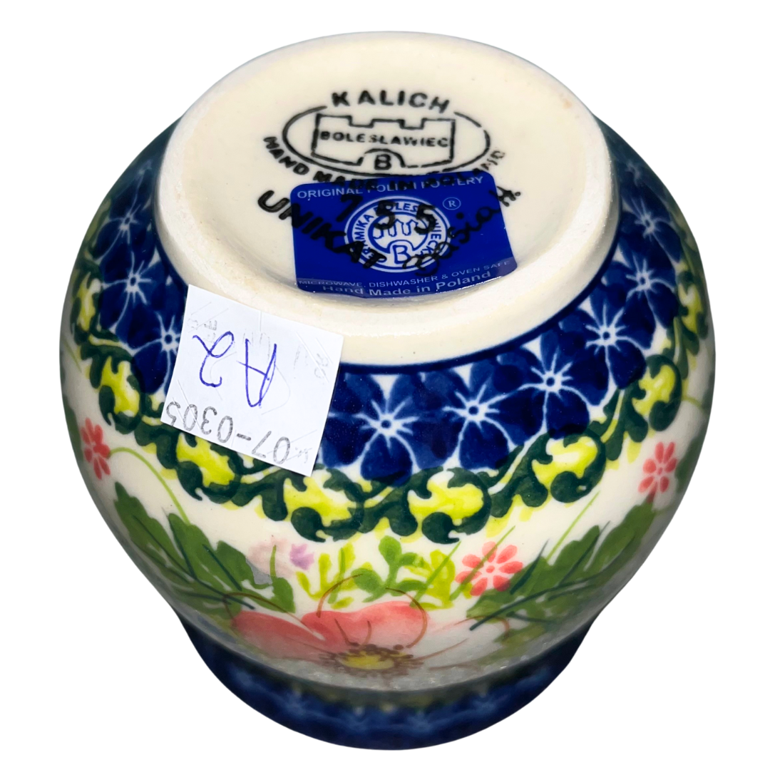 Kalich Ceramika Polish pottery Pattern 755 “Pink Ruffle” with soft pink flowers and colorful accents. Handmade stoneware, durable and dishwasher safe.