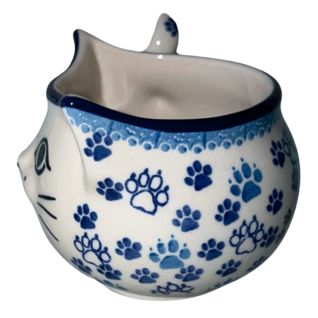 Ceramika Artystyczna Boo Boo Kitty 1771X Polish Pottery kitten cup and spoon set with black cat and blue paw prints, hand-painted in Bolesławiec, Poland.