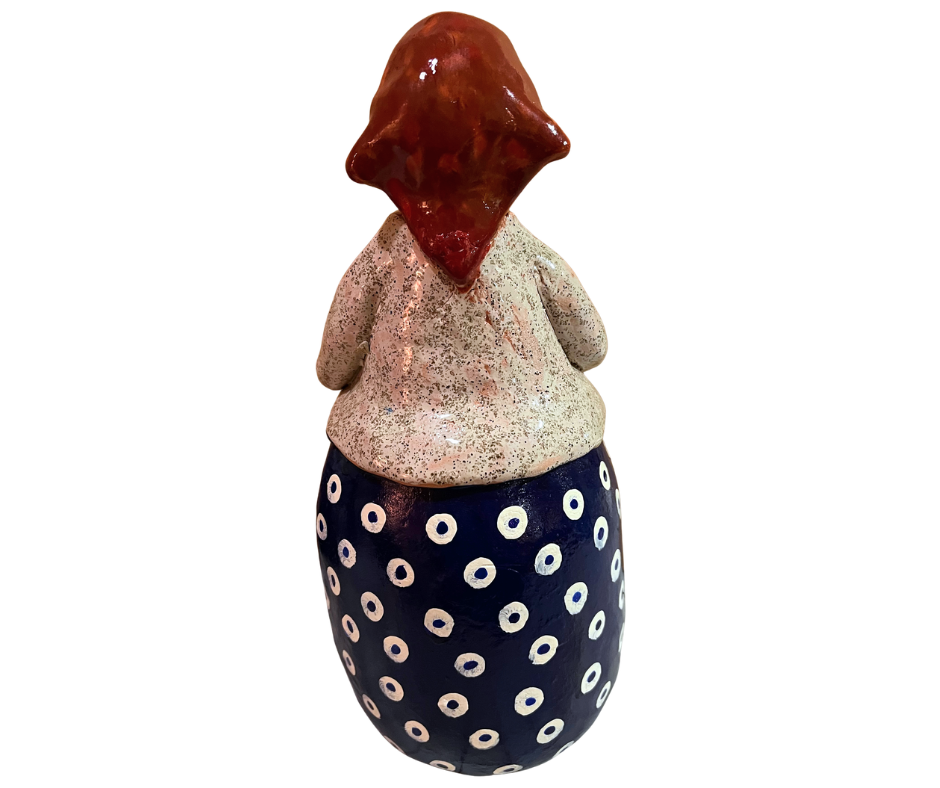 Hand-painted babcia grannie figurine holding a bowl of fresh eggs, wearing an aqua scarf and floral apron
