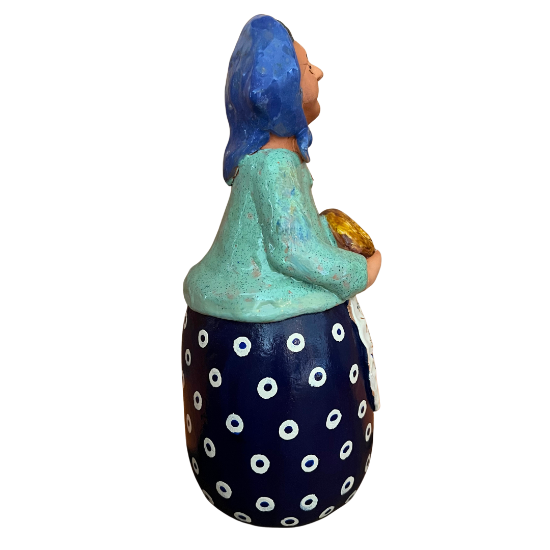 Hand-painted Polish folk art babcia grannie figurine holding a loaf of bread