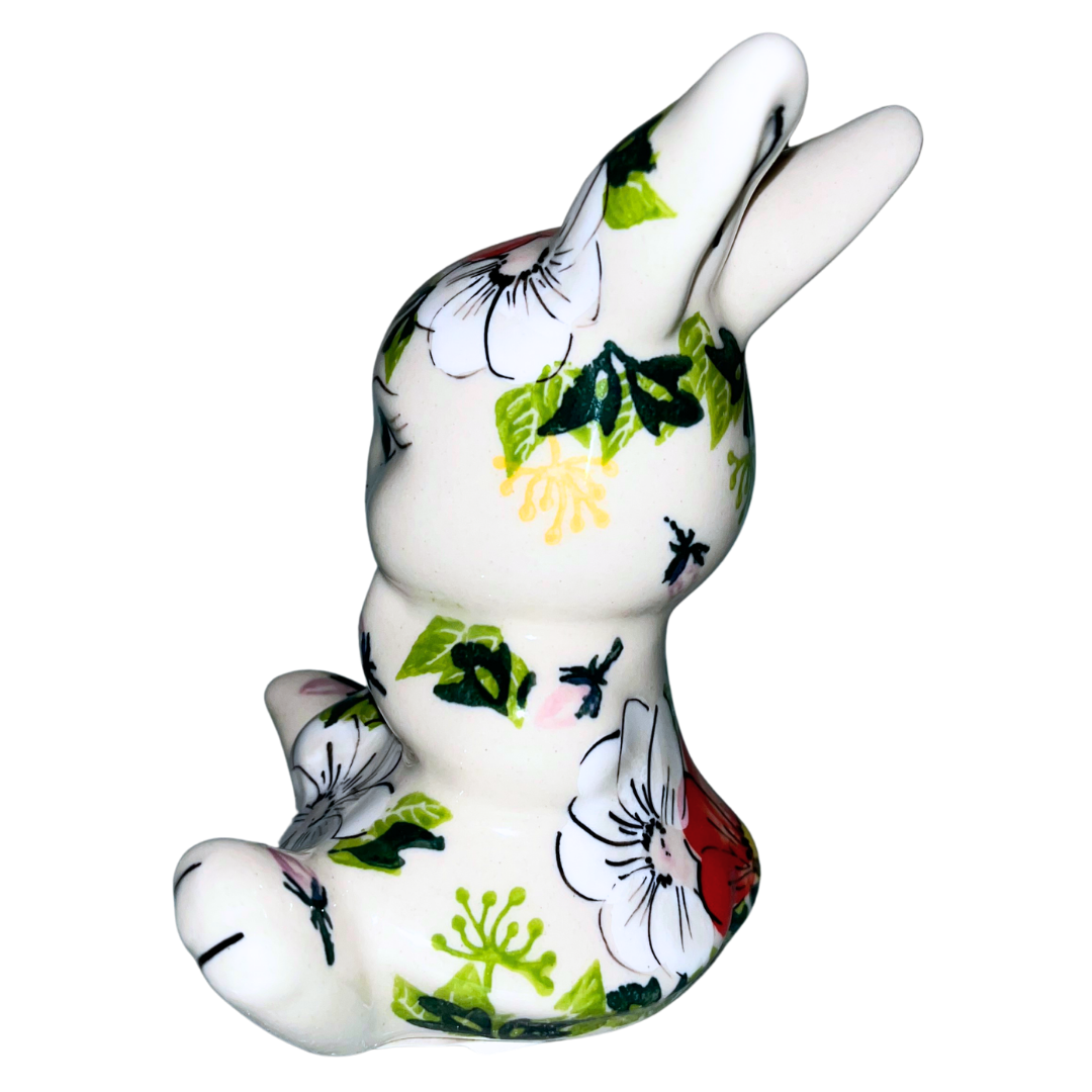 Hand-painted ceramic ballerina rabbit with red and white floral design. A charming decorative figurine perfect for spring décor, gifts, or whimsical home accents.