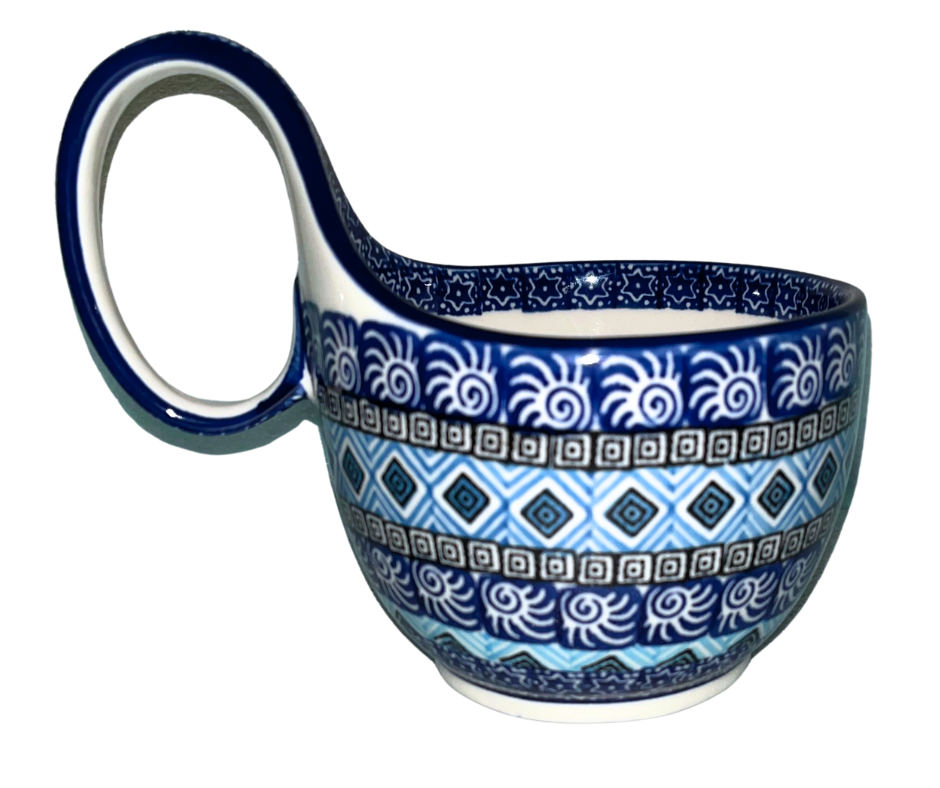 Ceramika Artystyczna 1917X Aztec Sky features geometric blue, white, and black bands with diamond and spiral motifs; hand-painted modern Polish pottery design with bold symmetry.