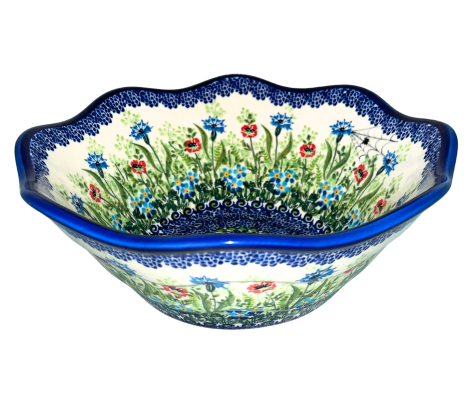 Hand-painted Kalich Polish pottery Viki bowl featuring wildflowers, poppies, and forget-me-nots with a scalloped rim. Durable stoneware, dishwasher, microwave, and oven safe.