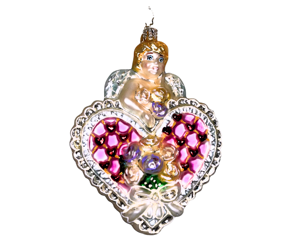 Christopher Radko Cupid’s Surprise ornament—hand-painted glass cherub with pink heart and flowers. Made in Poland, perfect for collectors and holiday romantics.