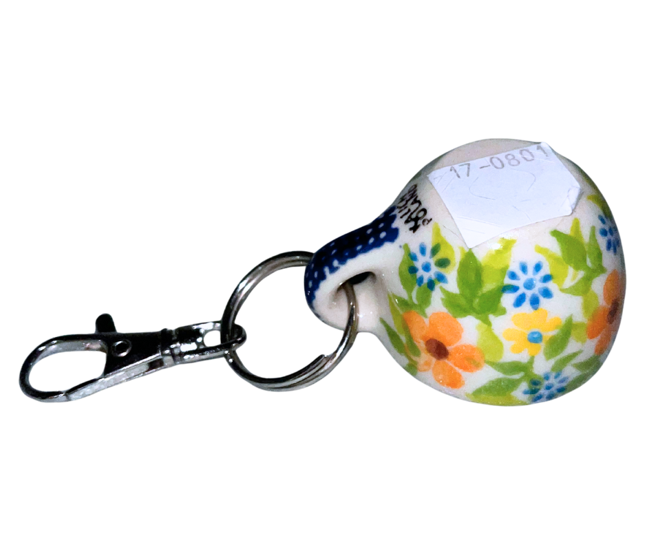 Hand-painted Polish Pottery key chain from Bolesławiec, Poland. Mini cup charm with floral design and metal clasp—perfect for keys, bags, or gifts.