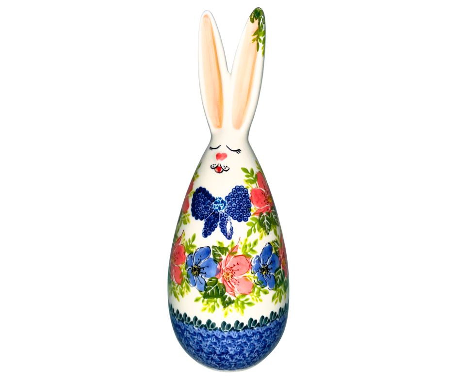 Handmade 12-inch Polish pottery bunny with blue bow tie by Ceramika Kalich. Hand-painted floral ceramic décor from Poland, perfect for Easter and spring displays.