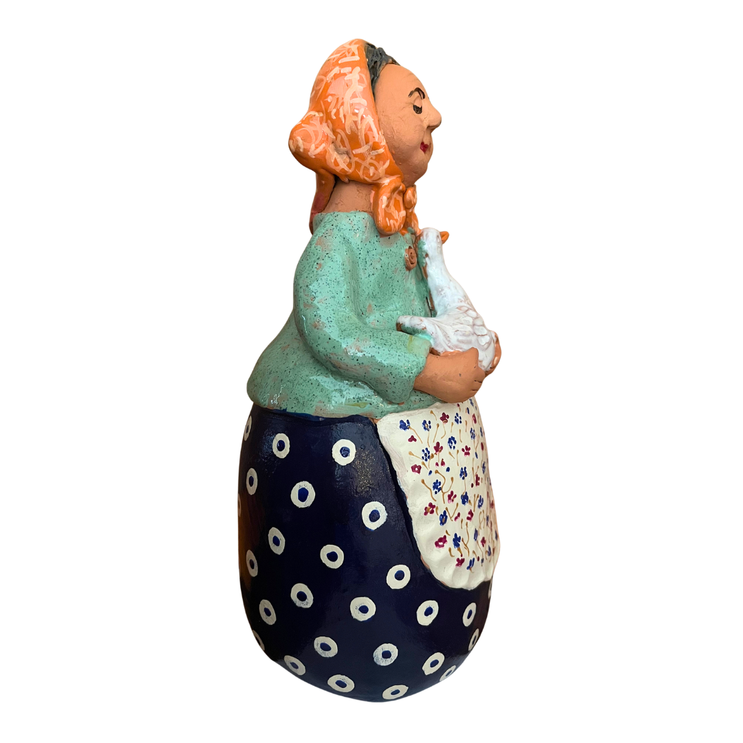 Hand-painted folk art babcia grannie figurine holding a duck