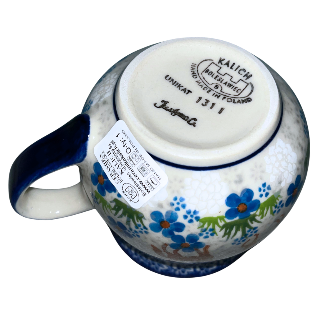 Ceramika Kalich Pattern 1311 features two horses among vibrant blue blossoms with a classic cobalt border. Hand-painted Polish pottery from Bolesławiec, Poland.