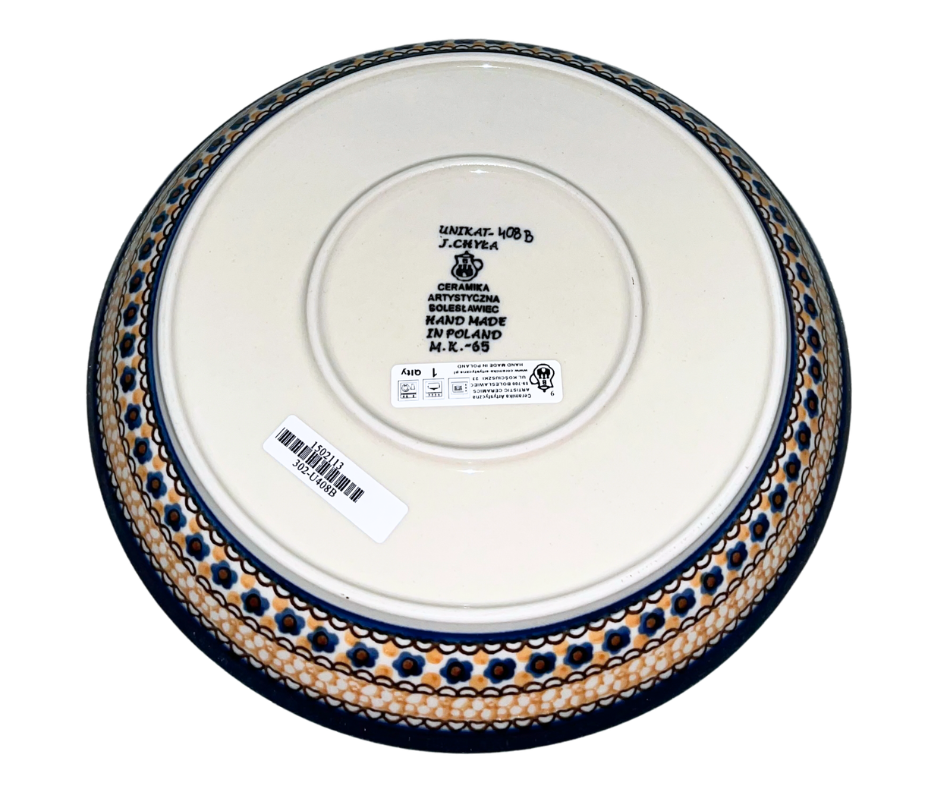 Hand-painted Ceramika Artystyczna Unikat 9" rimmed plate in U408B Marigold Dreams by Jacek Chyła. Authentic Polish pottery from Bolesławiec, oven and dishwasher safe.