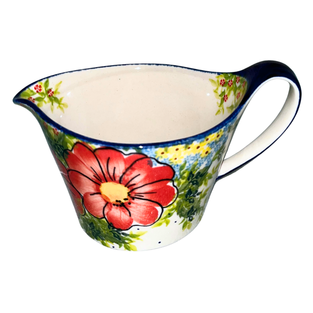 Kalich Polish Pottery Pattern 730 Red Poppy Garden, hand-painted red floral design with green foliage and cobalt accents, Bolesławiec stoneware, durable, dishwasher and microwave safe.