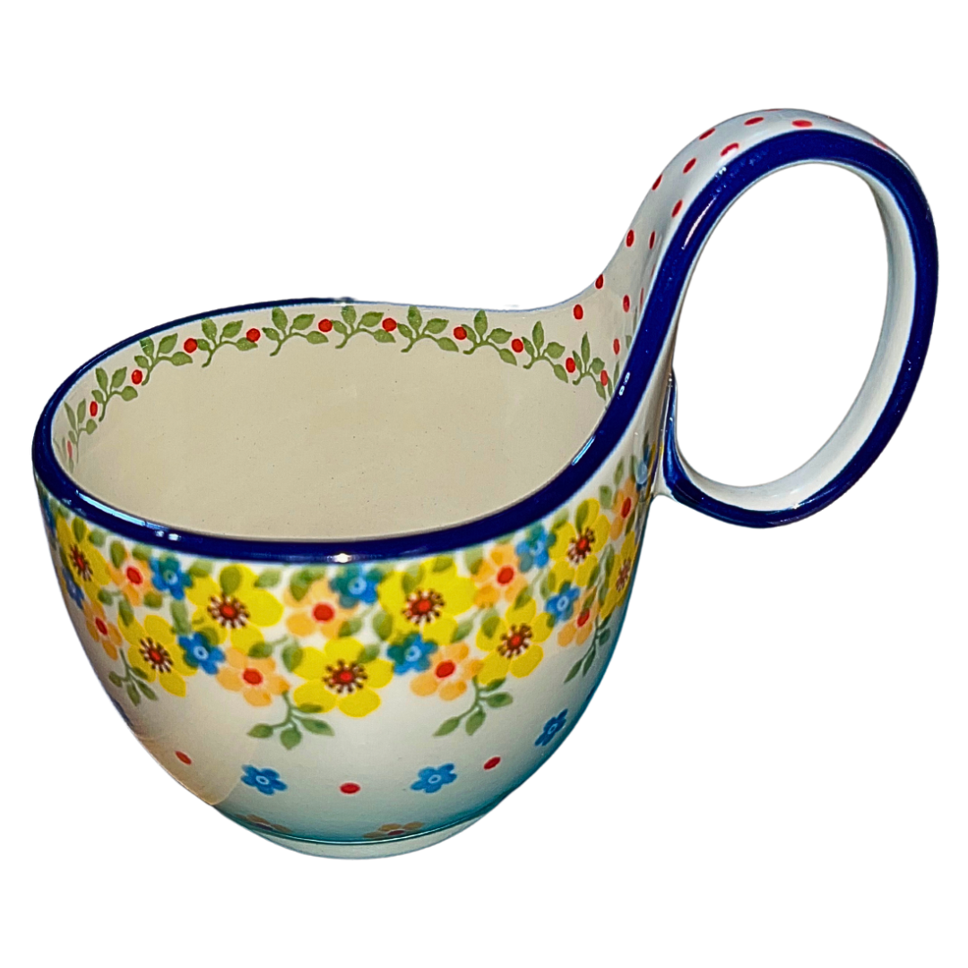 Hand-painted Polish pottery in Buttercup (2225X) features bright yellow florals and classic craftsmanship. Durable, dishwasher-safe, and made in Poland.