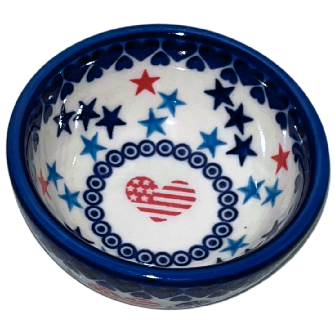 Ceramika Kalich Stars & Stripes features red, white and blue stars with patriotic heart motifs and cobalt accents. Hand-painted Polish pottery handcrafted in Poland.