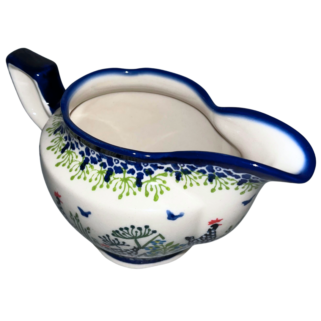 Kalich Pattern 950 gravy boat with hand-painted hens and floral details. Authentic Polish stoneware, durable, oven, microwave & dishwasher safe.
