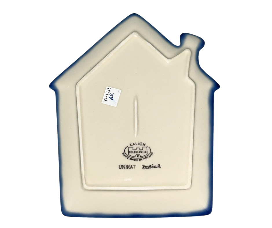 Ceramika Kalich hand-painted Polish pottery house plate featuring a cobalt blue roof and colorful floral garden design. Decorative cottage-shaped stoneware collectible.