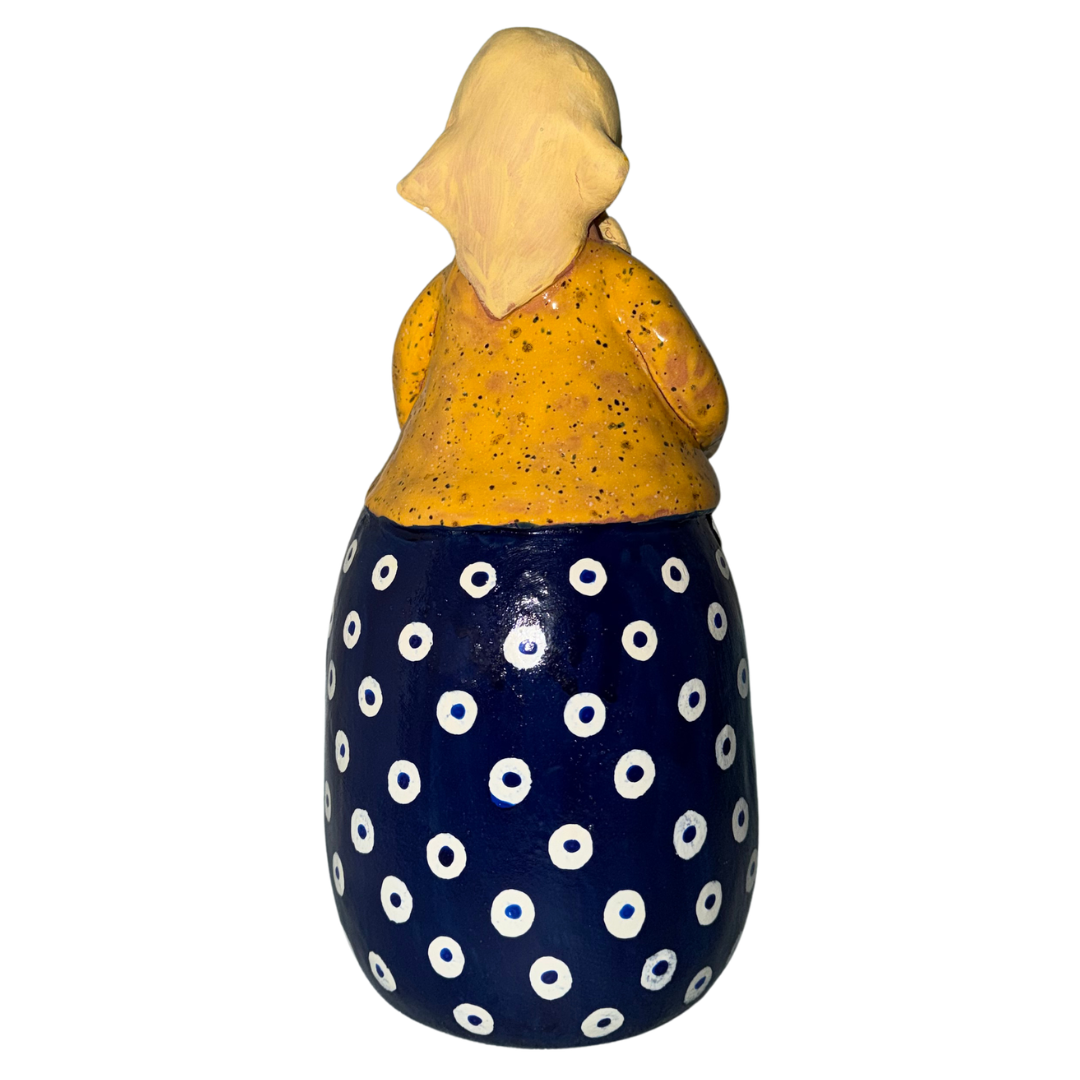 Hand-painted handcrafted babcia figurine holding a bowl of pierogi. (Copy)
