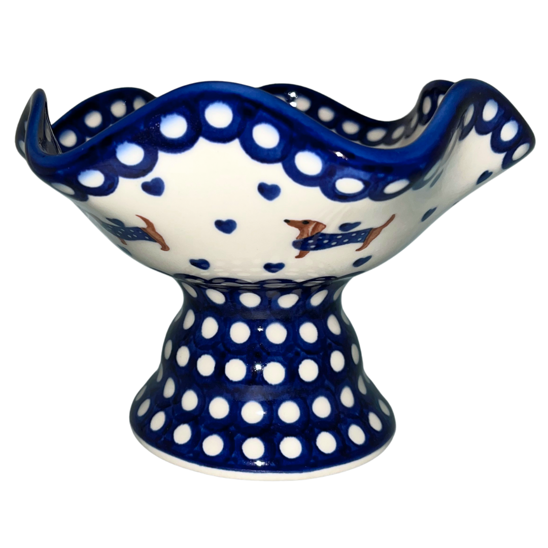 Ceramika Kalich Pattern 1322 Dachshunds features playful dachshunds in blue coats with scattered blue hearts and cobalt accents. Hand-painted Polish pottery from Poland.