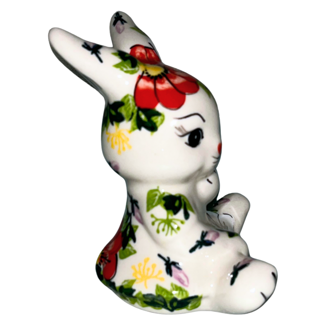 Hand-painted ceramic ballerina rabbit with red and white floral design. A charming decorative figurine perfect for spring décor, gifts, or whimsical home accents.