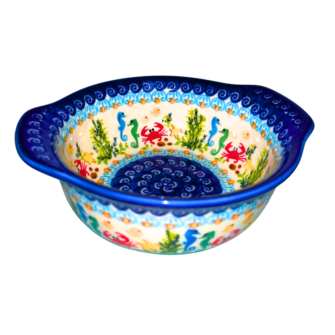 Handmade Ceramika Kalich Polish pottery in Pattern 884 Sealife with Red Crabs. Colorful coastal design featuring seahorses, starfish, and crabs. Microwave oven and dishwasher safe stoneware.