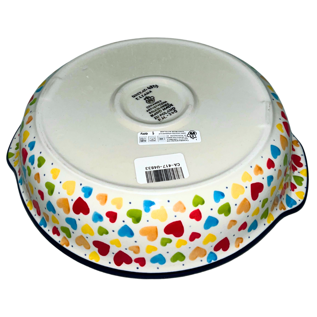 Ceramika Artystyczna Pattern U4833 Colorful Hearts features vibrant multicolored hearts on an ivory background with cobalt accents. Handcrafted Polish pottery from Bolesławiec.