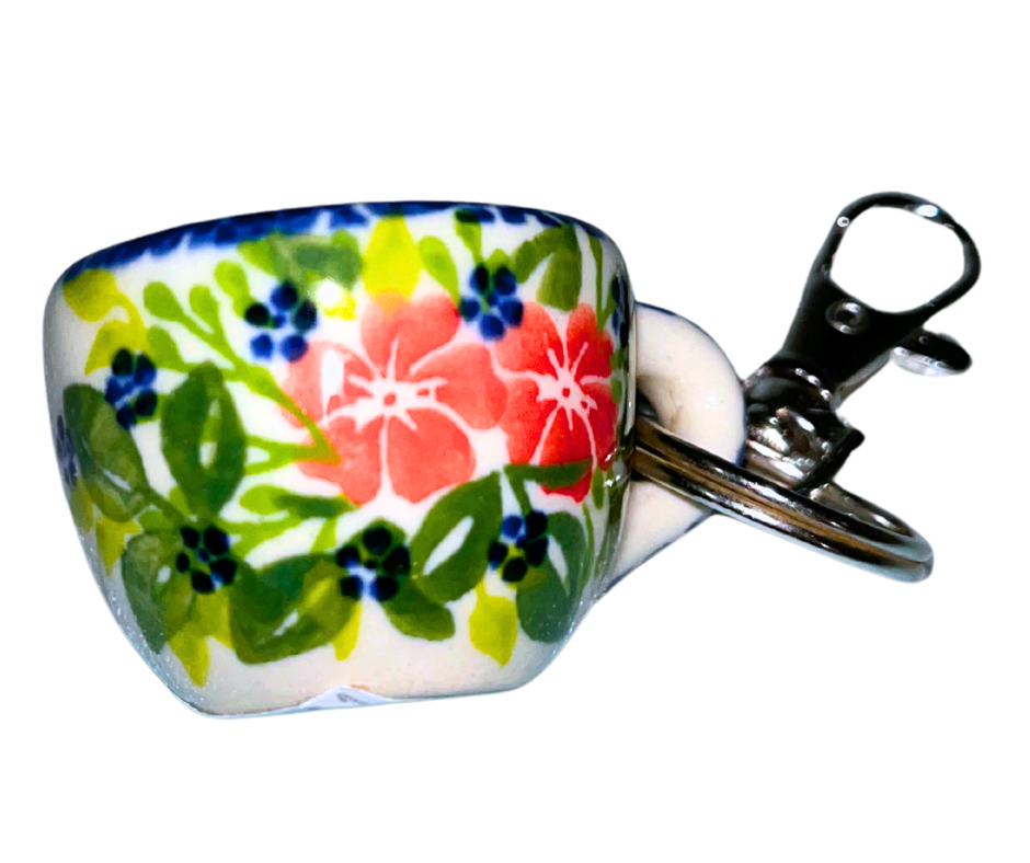 Hand-painted Polish Pottery key chain from Bolesławiec, Poland. Mini cup charm with floral design and metal clasp—perfect for keys, bags, or gifts.