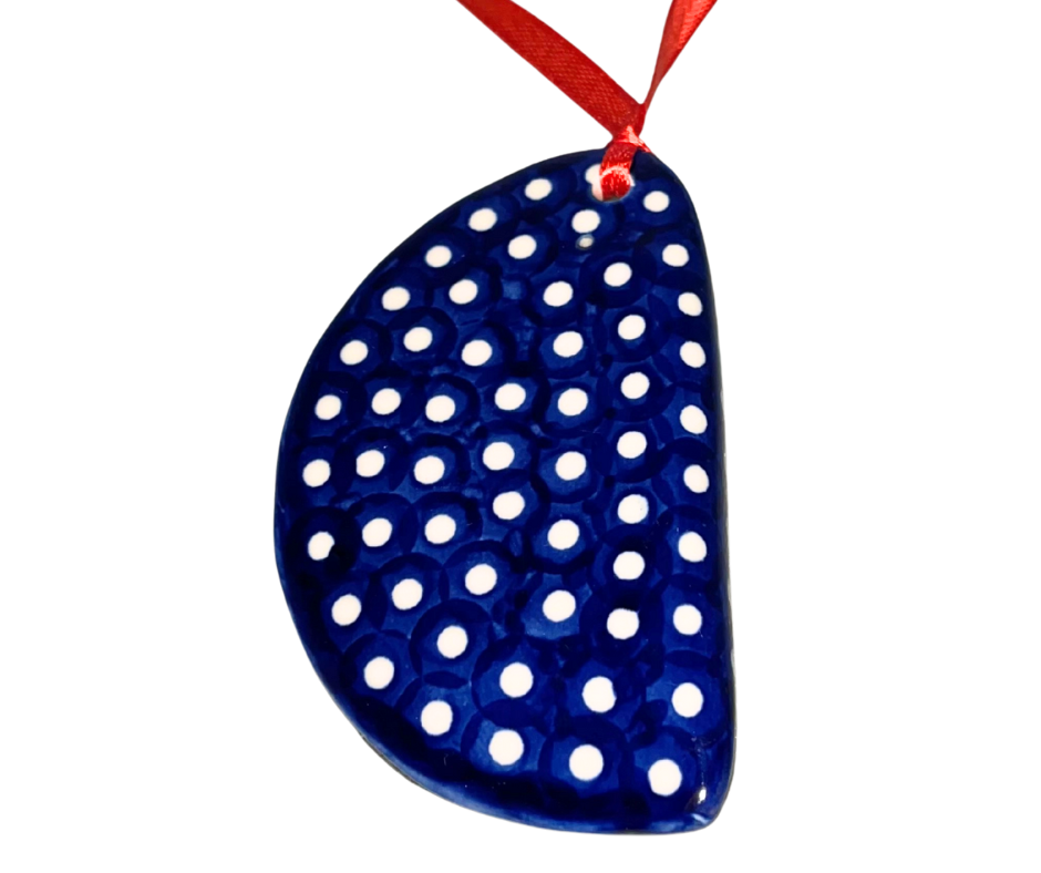 Handmade Polish Pottery pierogi ornament by Kaola Studio. Hand-painted blue and white ceramic with red ribbon. A charming Polish folk art collectible.