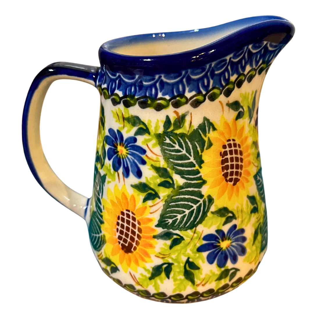 Ceramika Kalich Pattern 580 Sunflowers Polish pottery featuring bright sunflower and blue floral design. Authentic handcrafted Bolesławiec stoneware, durable, dishwasher, microwave, and oven safe.