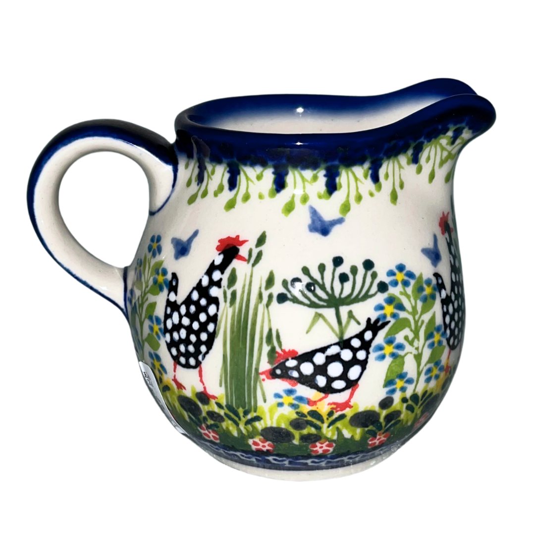 10-0502 CREAMER KUBUS BACK.png