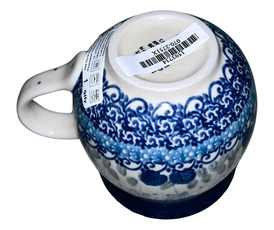 Ceramika Artystyczna Polish pottery in pattern 2898X Little Gems features intricate cobalt and teal florals with a textured gem-like center. Handmade stoneware from Bolesławiec, Poland.
