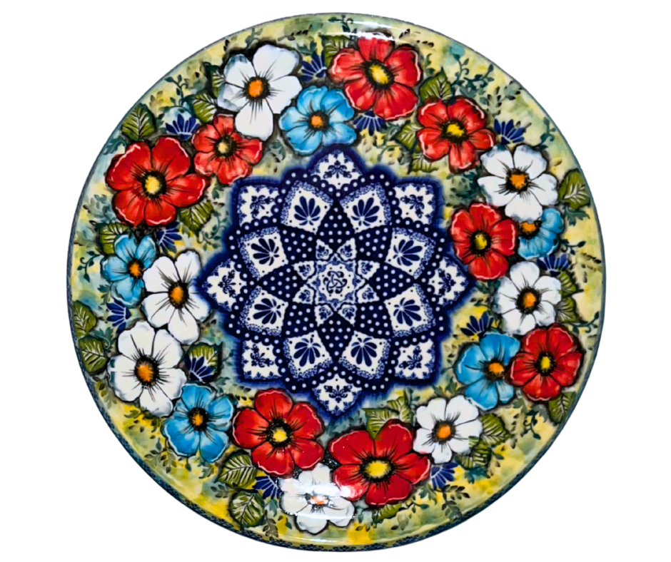 Limited edition 14.25” round charcuterie board by Kaola Studio, signed by Aga K. Features vibrant red, white & blue floral wreath with intricate cobalt mandala center.