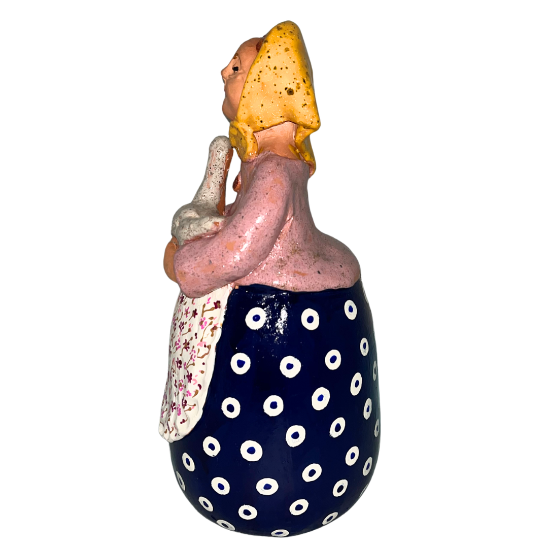 Hand-painted folk art babcia grannie figurine holding a duck