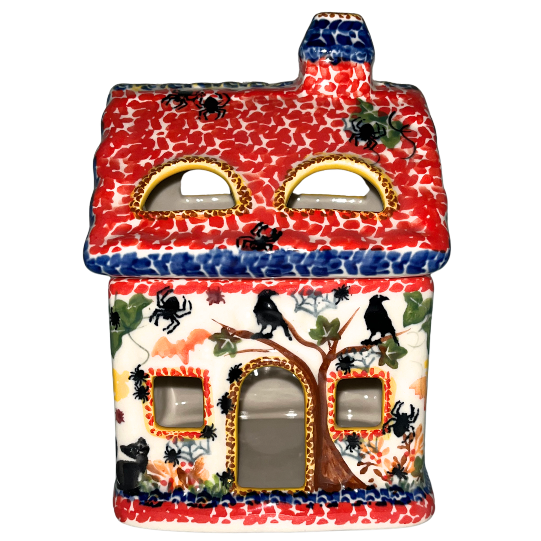 Hand-painted Kalich Polish Pottery Halloween House Luminary from Bolesławiec, Poland, featuring black cats, ravens, spiders, bats and autumn details.