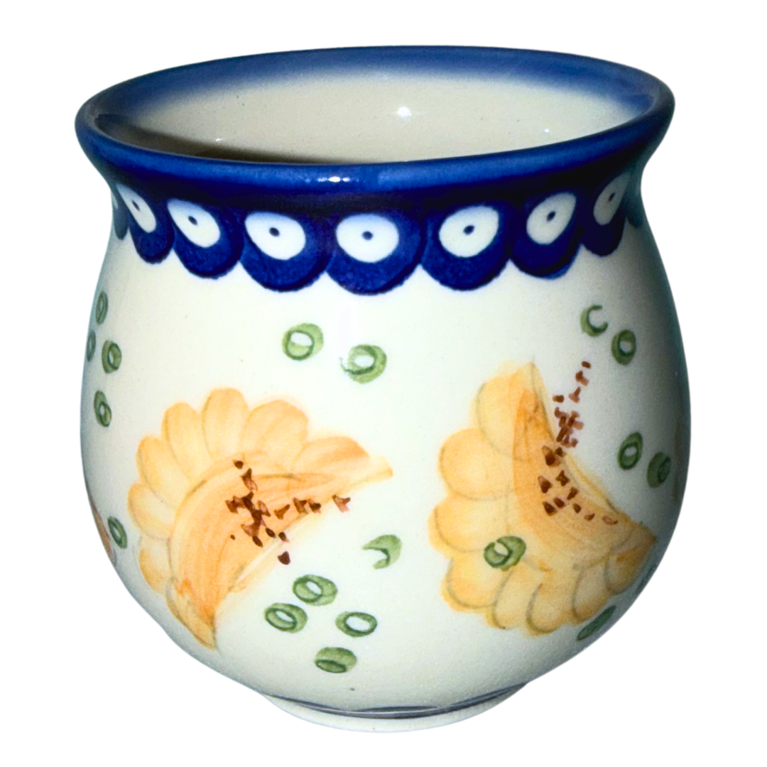 Ceramika Kalich Polish Pottery Pattern 1447 Pierogis bubble mug, hand-painted with golden pierogi, green accents and a cobalt blue border.