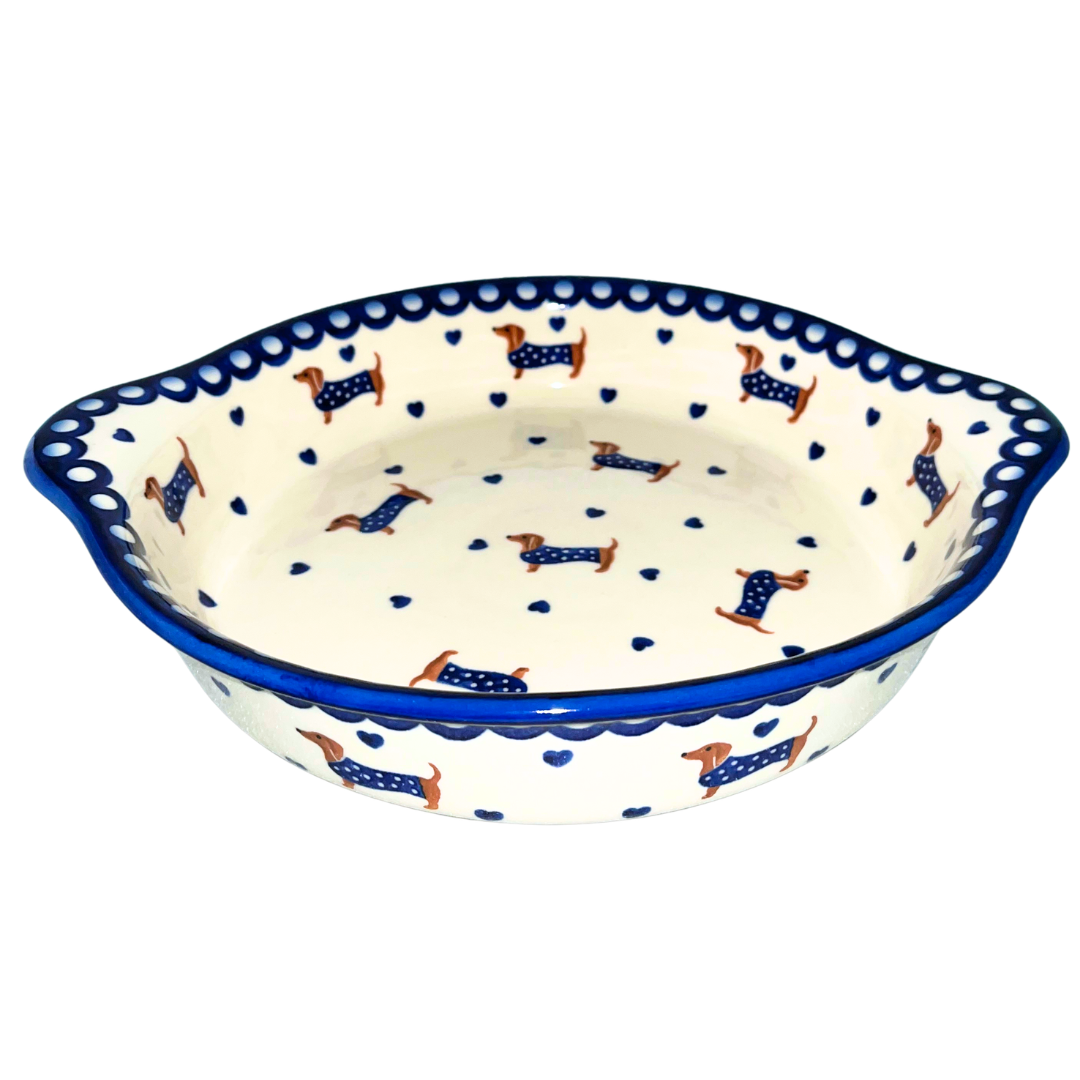 Ceramika Kalich Pattern 1322 Dachshunds features playful dachshunds in blue coats with scattered blue hearts and cobalt accents. Hand-painted Polish pottery from Poland.
