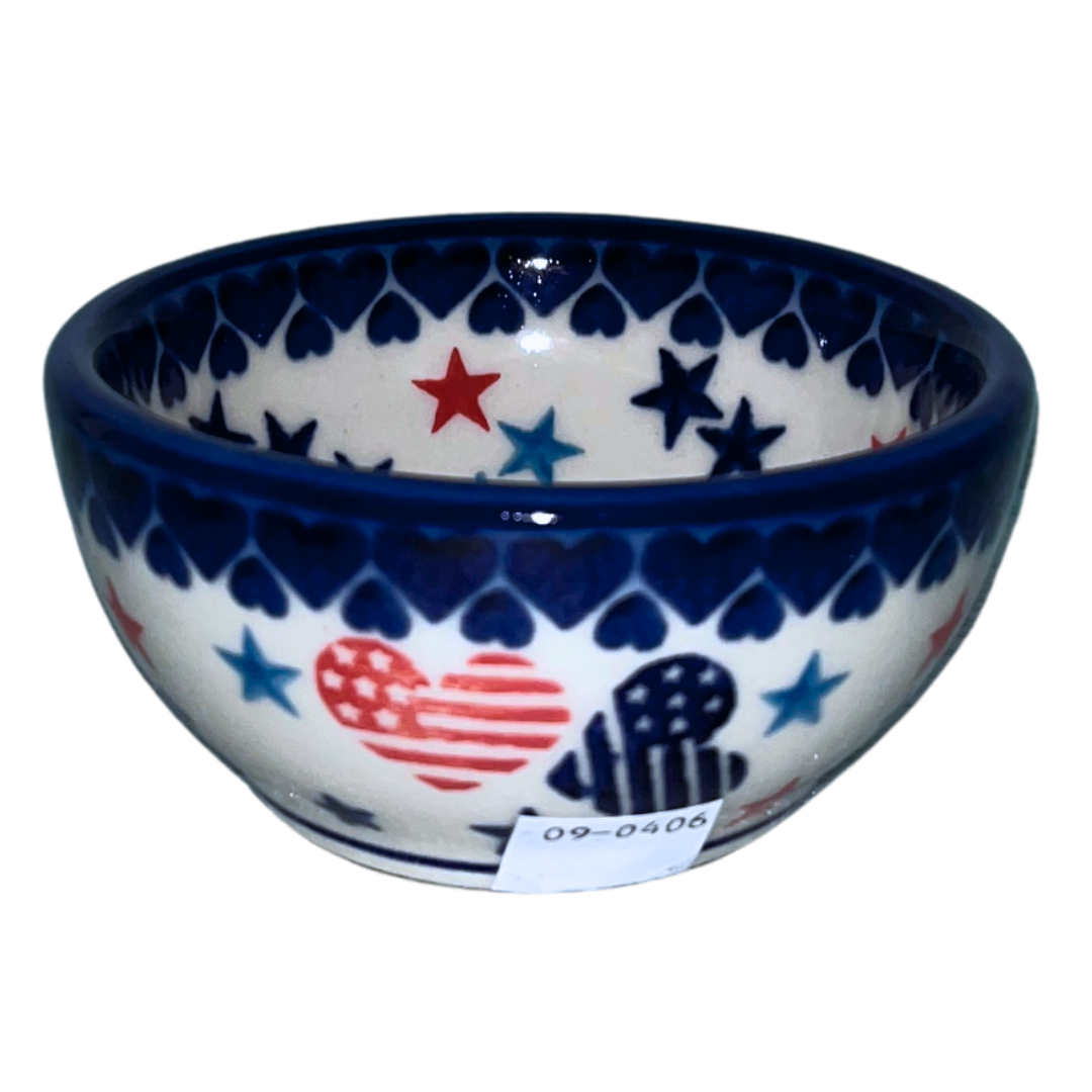 Ceramika Kalich Stars & Stripes features red, white and blue stars with patriotic heart motifs and cobalt accents. Hand-painted Polish pottery handcrafted in Poland.