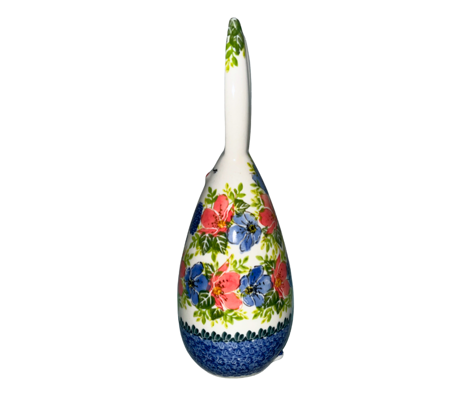 Handmade 12-inch Polish pottery bunny with blue bow tie by Ceramika Kalich. Hand-painted floral ceramic décor from Poland, perfect for Easter and spring displays.