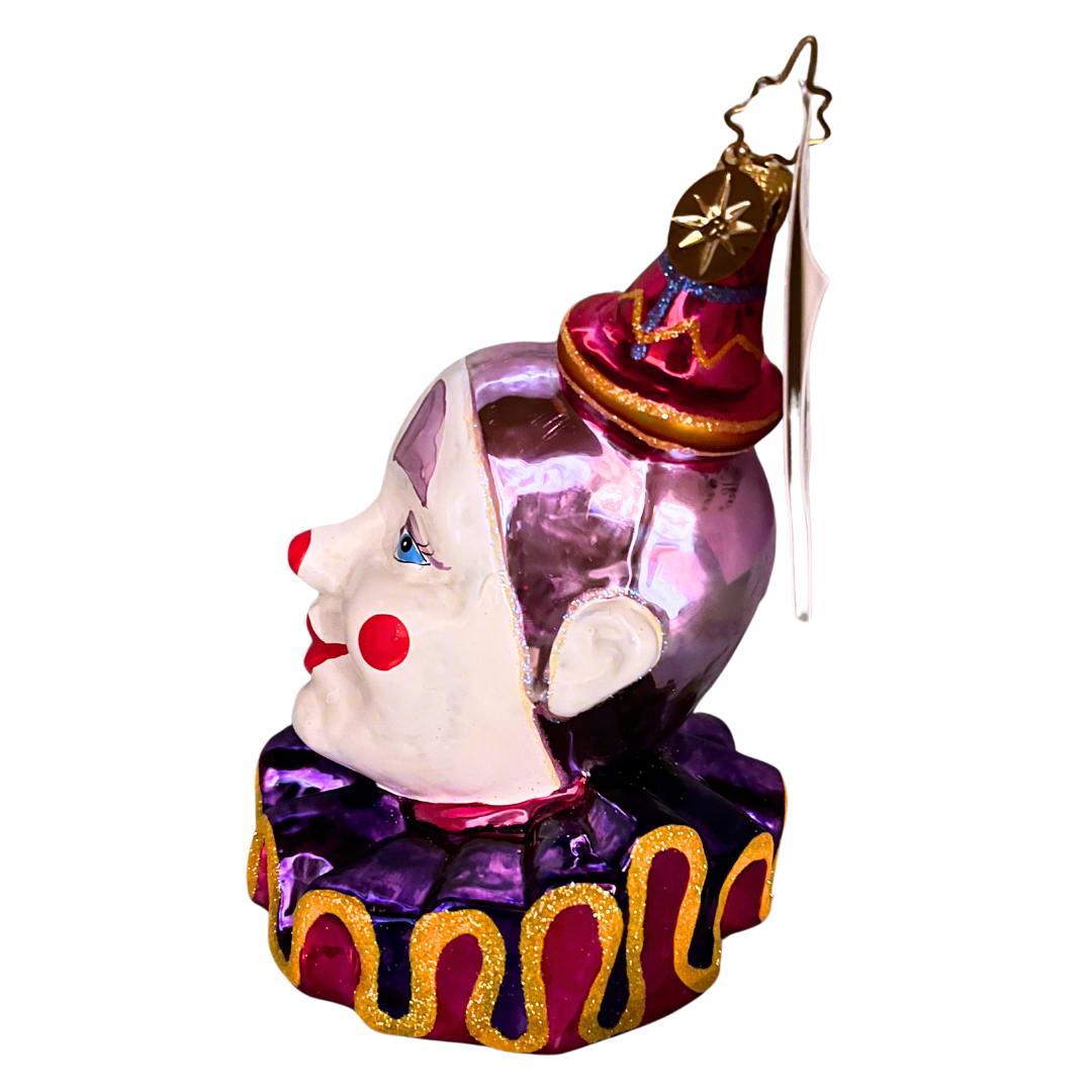 1010771 Christopher Radko Clown Around Classics ornament—hand-painted glass clown with purple and gold accents. Made in Poland, full of vintage circus whimsy and holiday cheer.