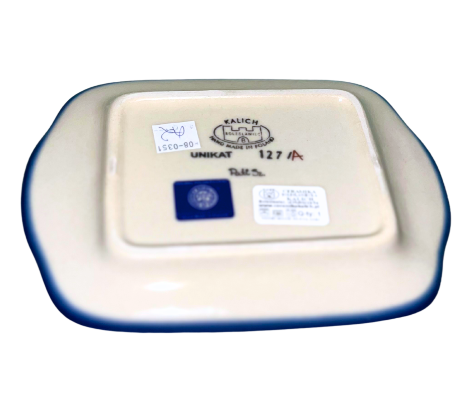 Kalich Polish Pottery 127/A Wildflowers Americana features red poppies, white daisies, and blue blooms on green with a cobalt rim; hand-painted floral design with Americana color palette.