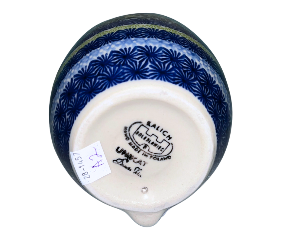 Handmade 12-inch Polish pottery bunny with blue ear bow by Ceramika Kalich. Hand-painted floral ceramic décor from Poland, perfect for Easter and spring displays.