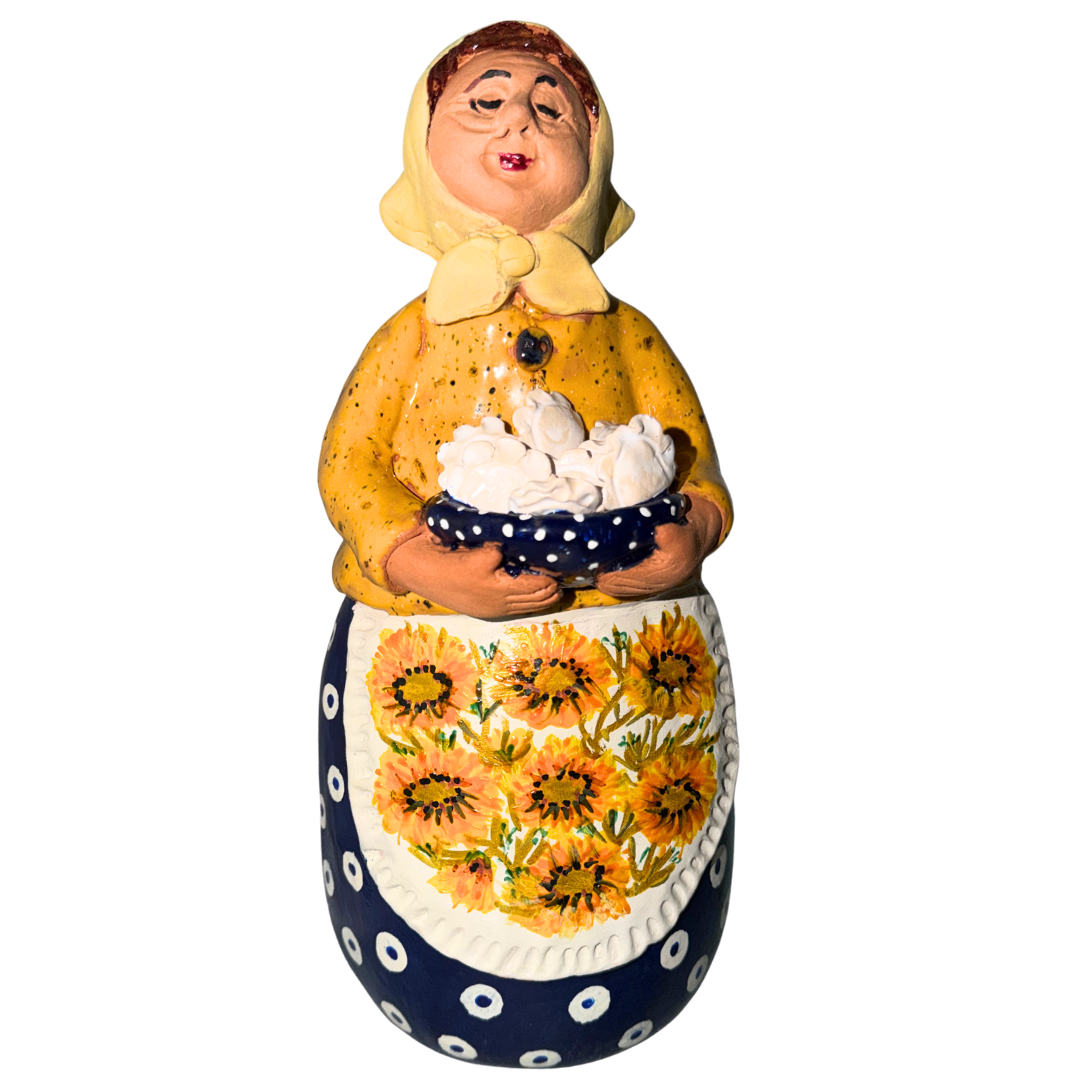 Hand-painted handcrafted babcia figurine holding a bowl of pierogi. (Copy)