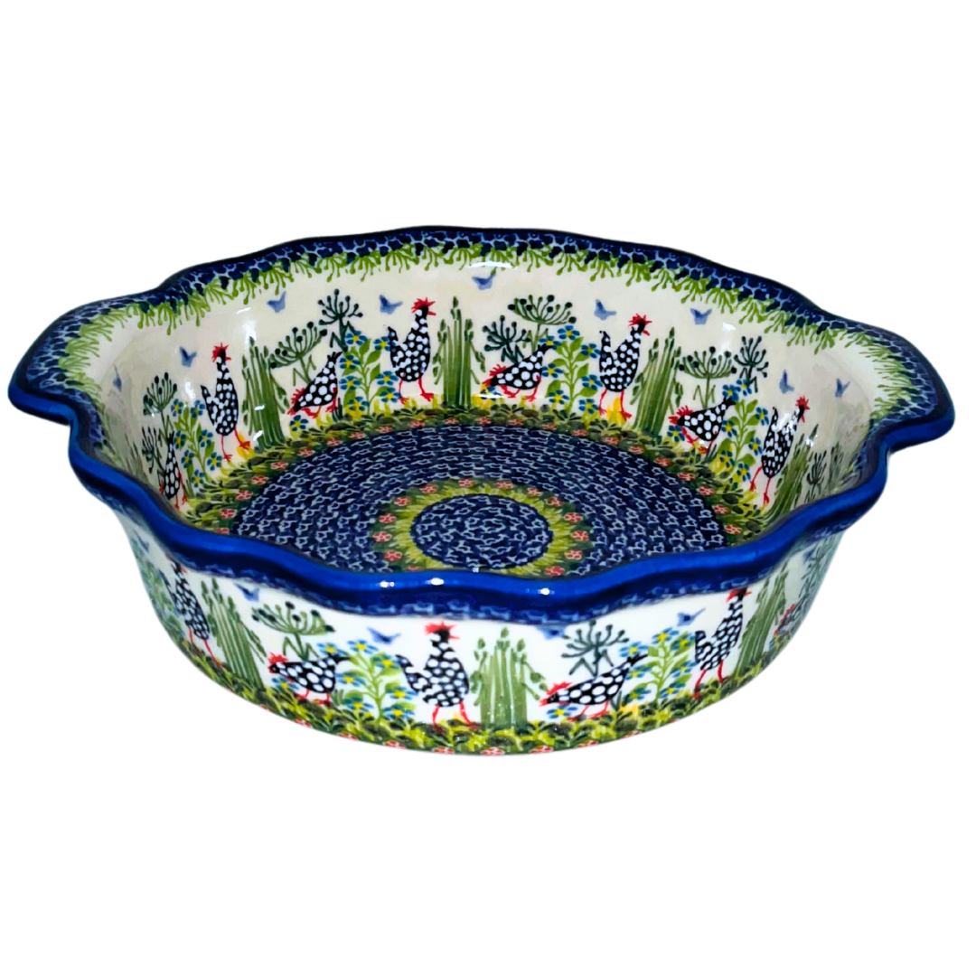 Kalich Pattern 950 10 inch round baker hand-painted hens and floral details. Authentic Polish stoneware, durable, oven, microwave & dishwasher safe.