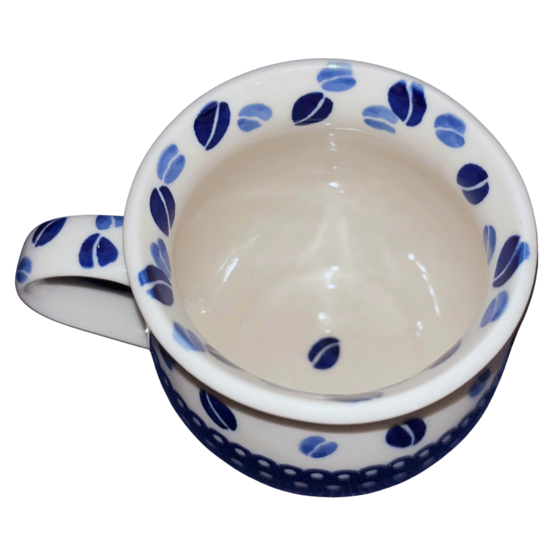Handmade Kaola Polish Pottery in the Blue Coffee Beans pattern. Authentic Bolesławiec stoneware featuring hand-painted cobalt blue coffee bean motifs.