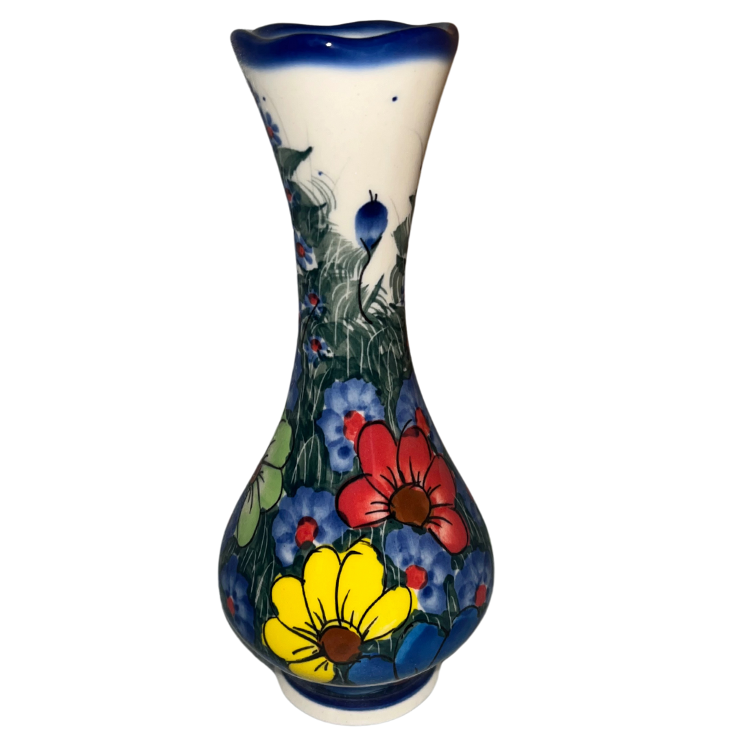 7 inch Swirl Vase Ceramika Kalich’s Pattern 127 “Wildflowers,” features blooming flowers in several color variations set against a cream and cobalt-blue background.