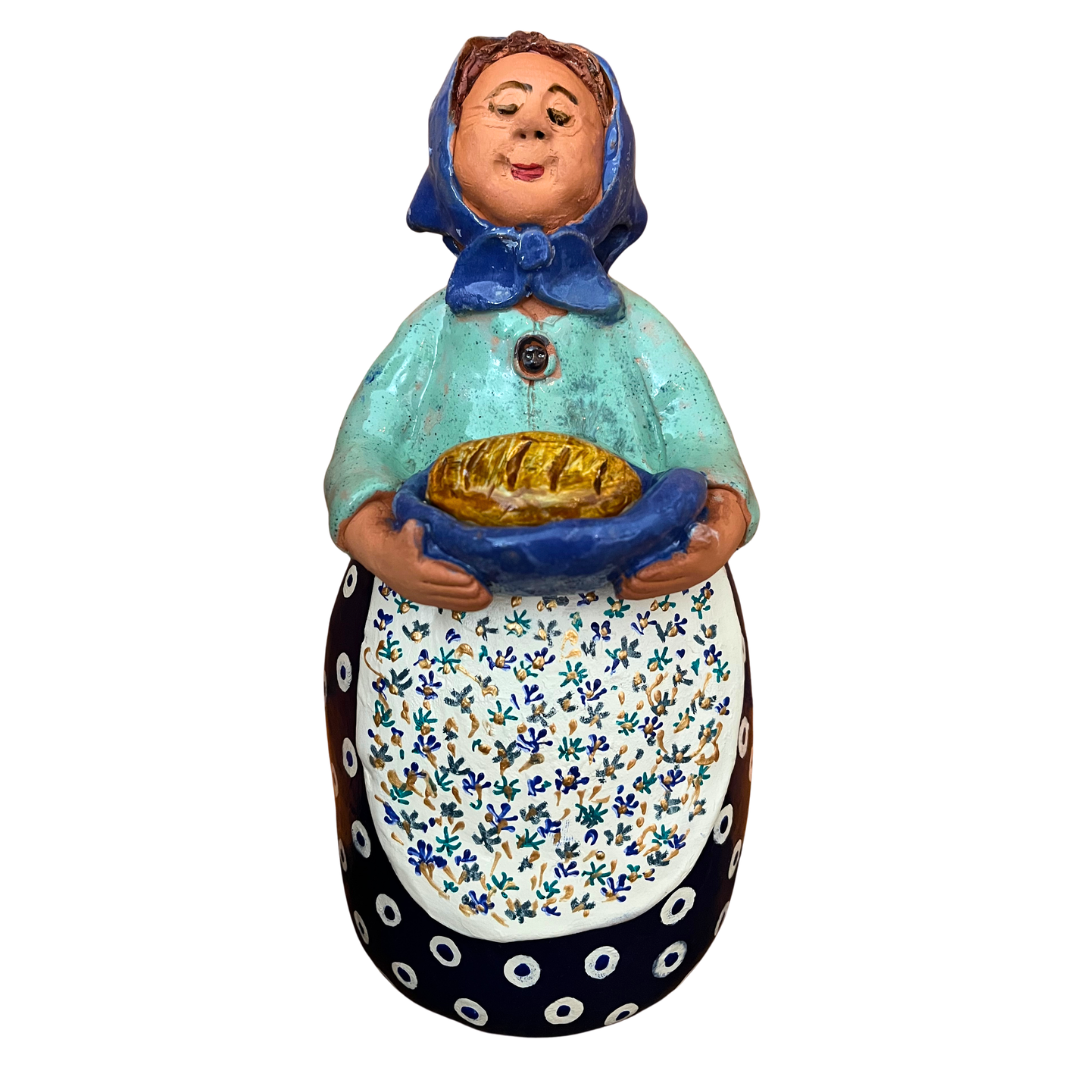 Hand-painted Polish folk art babcia grannie figurine holding a loaf of bread