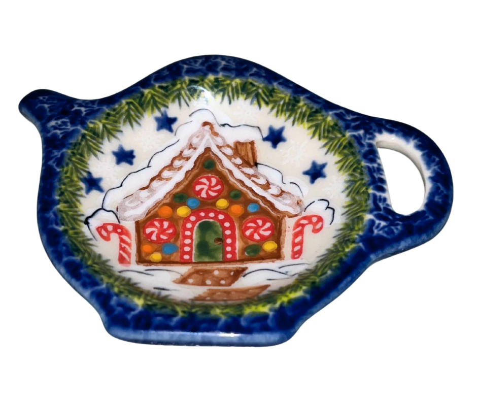 Tea Bag Rest featuring a whimsical gingerbread house adorned with peppermint swirls, candy canes, colorful gumdrops, and snowy icing details.