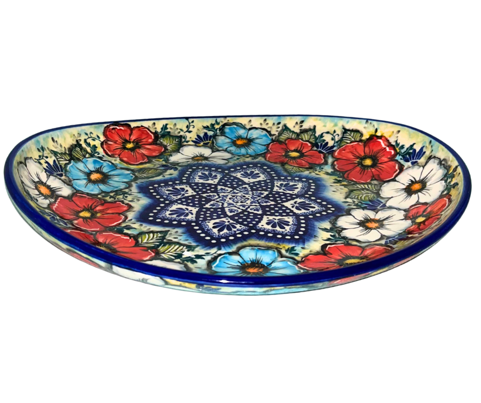 Limited edition 14x12.75x2.5 oblong ceramic platter by Kaola Studio, signed by Aga K. Features red, white & blue florals with cobalt mandala center. Handmade in Poland.
