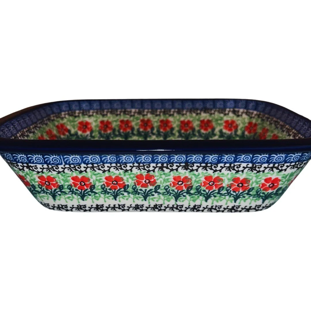 Ceramika Artystyczna Maraschino pattern 1916 Polish pottery. Hand-painted stoneware featuring red flowers and cobalt scrollwork. Dishwasher, microwave, oven, and freezer safe.