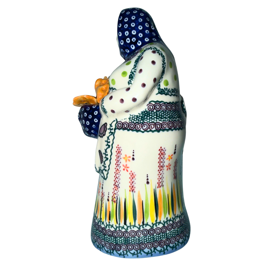 Galia Polish Pottery Babcia holding a bowl of pierogi. 9-inch handmade and hand-painted Polish Grannie figurine from the Bolesławiec region of Poland.